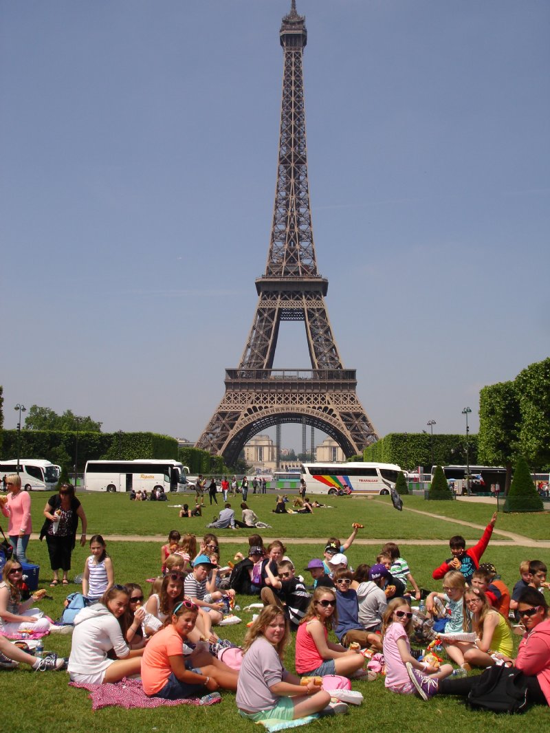 Enjoying a picnic under the Eiffel Tower